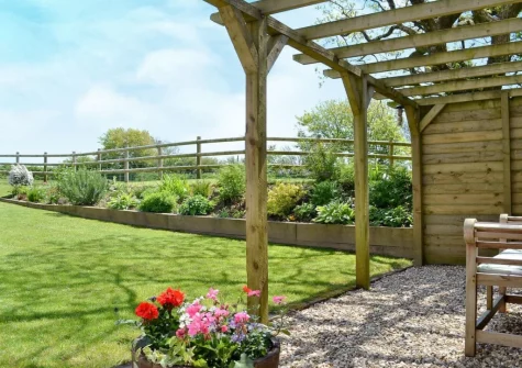 The enclosed garden & outdoor sitting area at Jacks Barn, Welcombe