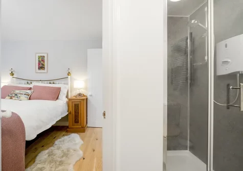 Bedroom #1 & en-suite shower room at Jade Cottage, St Agnes