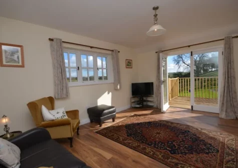 The living room at Jasmine Cottage at Little Roseveth, Tregavethan