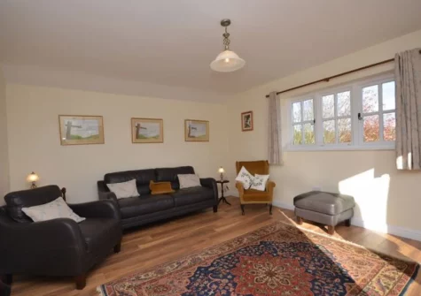 The living room at Jasmine Cottage at Little Roseveth, Tregavethan