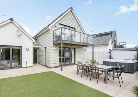 The patio, alfresco dining area, hot tub & garden at Jindalee, Westward Ho!