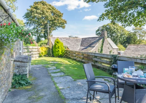 The patio, barbecue & alfresco dining area at Jingles at Penrose Burden, St Breward