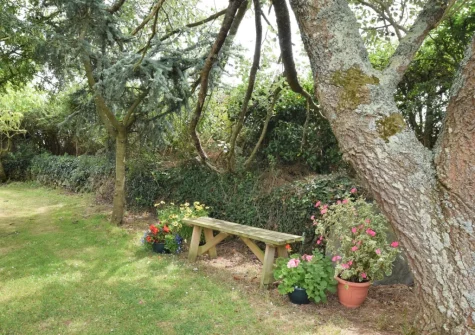 The large enclosed private garden & outdoor sitting area at Jobes Cottage, Chapel Amble