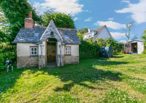 The cottage-style children's playhouse & garden at Jobs Cottage, Carleen