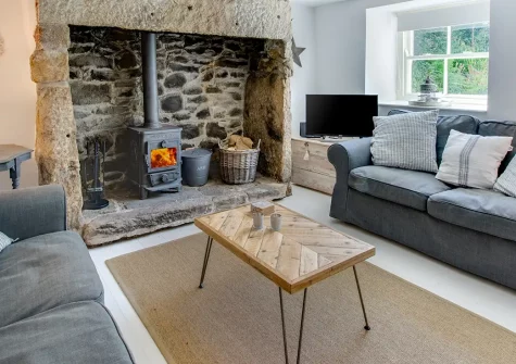 Jobs Cottage, Carleen is a charming traditional Cornish stone cottage with original features, large enclosed garden, and delightful stone playhouse. Perfect for families seeking peaceful countryside tranquillity near golden beaches and villages.