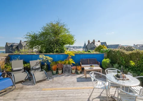 The decked patio, alfresco dining & outdoor sitting area at Joy House, Padstow