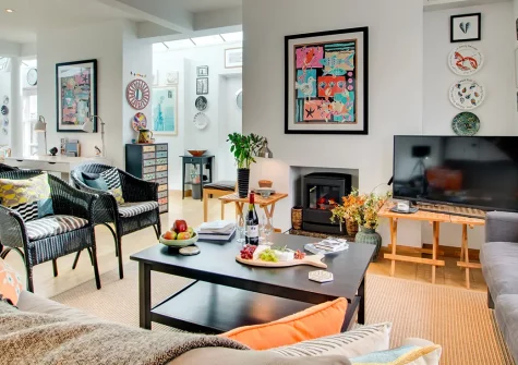 Joy House, Padstow is a bright three-bedroom townhouse perfectly positioned in the heart of Cornwall's celebrated foodie capital. Enjoy private parking, a raised sundeck with stunning estuary views, and effortless access to renowned restaurants.