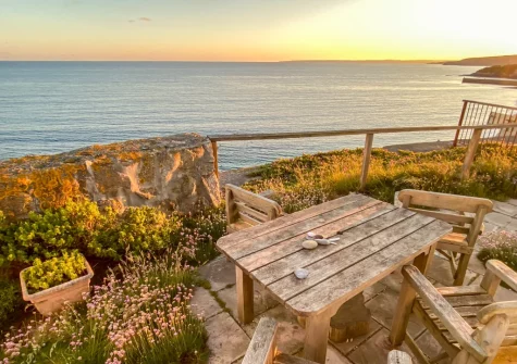 The private garden & alfresco dining area, overlooking ocean with amazing views, at Kelynack, Porthleven
