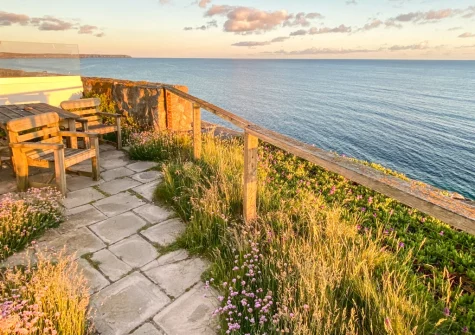 The private garden & outdoor sitting area, overlooking ocean with amazing views, at Kelynack, Porthleven