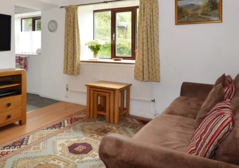 Kempthornes, Ugborough is a delightful two-bedroom cottage at the end of a private drive, nestled within beautiful gardens with far-reaching countryside views, a cosy wood burner, and easy access to Dartmoor's magnificent landscapes & Devon's coast.