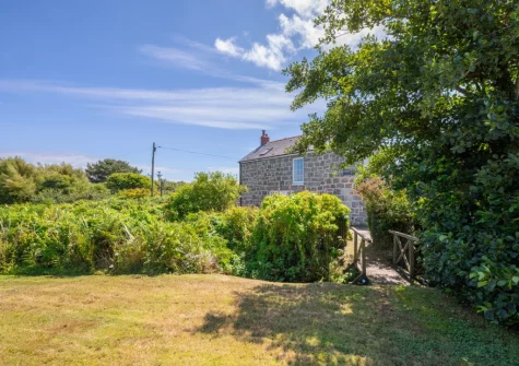 half-acre lawned garden with stream