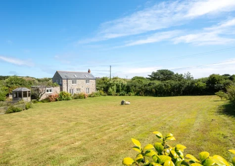 The half-acre lawned garden with stream at Kemyel Mill, Lamorna