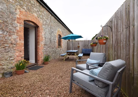 The enclosed courtyard at Kenniford Cider Steps, Clyst St George
