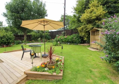 The decked patio, alfresco dining area & garden at Kessenyans Studio, Goonhavern