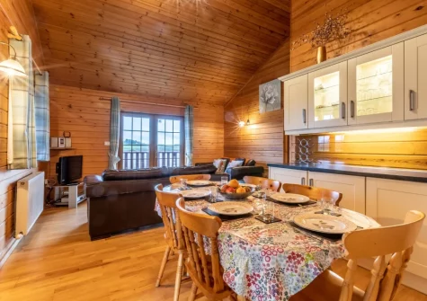 The kitchen & dining area at Kestrel Lodge 15 at Clovelly Lakes, Higher Clovelly