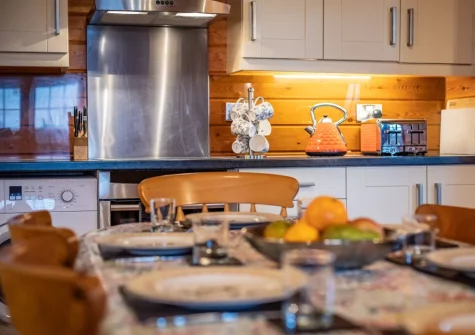 The kitchen & dining area at Kestrel Lodge 15 at Clovelly Lakes, Higher Clovelly