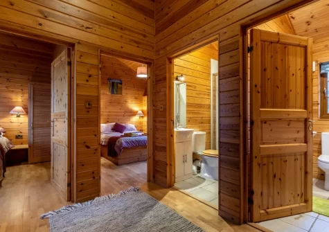 The hallway to the bedrooms at Kestrel Lodge 15 at Clovelly Lakes, Higher Clovelly