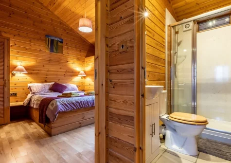 Bedroom #1, next to the shower room, at Kestrel Lodge 15 at Clovelly Lakes, Higher Clovelly