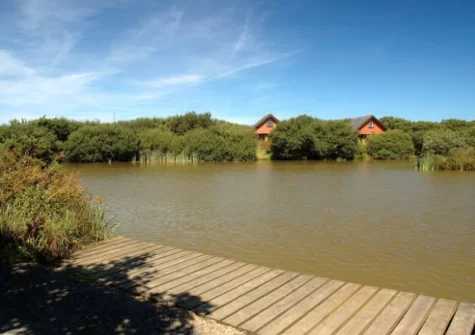 Explore 40 acre grounds with five fishing lakes fed by running water