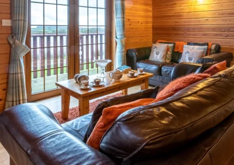 Kestrel Lodge 15, Clovelly Lakes is a spacious three-bedroom lodge set right on the lake's edge, with a private balcony, Jacuzzi bath, complimentary fishing, and easy access to Clovelly's coastline and North Devon's finest family attractions.