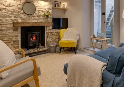 Killas Cottage, Fowey is an enchanting 18th-century retreat featuring exposed stone walls, timber beams, and warming wood burner. Nestled along a peaceful passage near Fowey harbour, perfect for couples and families exploring Cornwall.