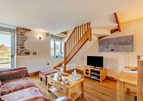 The living area at Kingfisher Barn Lakes, St Giles-on-the-Heath