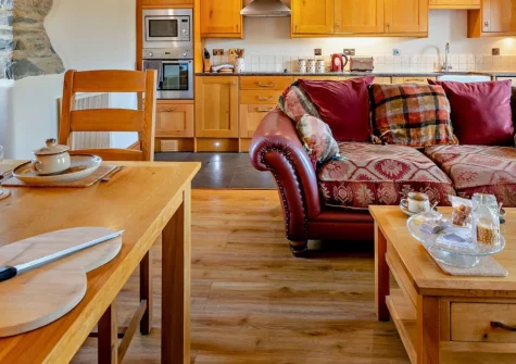 Kingfisher Barn Lakes, St Giles-on-the-Heath is a characterful barn conversion on the Devon-Cornwall border, featuring exposed stonework, a stargazing skylight, private fishing lakes, and easy access to both Dartmoor and Cornwall's Atlantic coast.