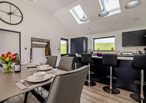The kitchen & dining area at Kingfishers Retreat, Hopworthy