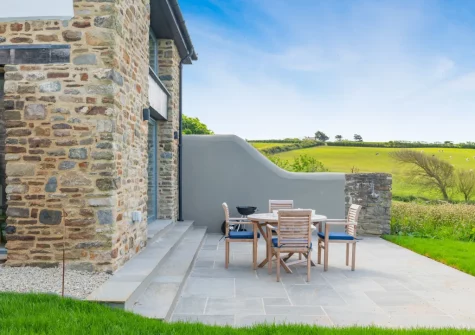 The patio, barbecue & alfresco dining area & garden at Kingsland Barn, Greencliff Farm, Abbotsham