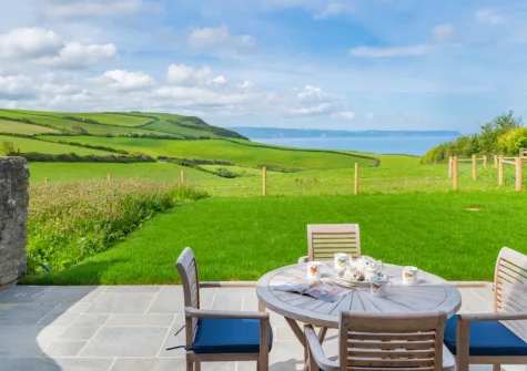 The patio, barbecue & alfresco dining area & garden at Kingsland Barn, Greencliff Farm, Abbotsham