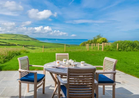 The patio, barbecue & alfresco dining area & garden at Kingsland Barn, Greencliff Farm, Abbotsham