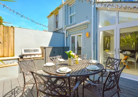 The decked patio, barbecue  & alfresco dining area at Kittiwake, Padstow