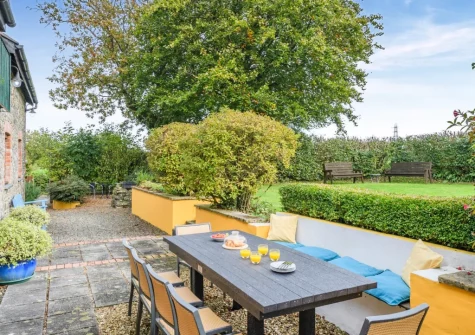 The patio & alfresco dining area at Knaworthy, Frithelstock Stone