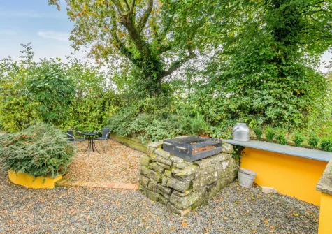 The woodland barbecue & outdoor sitting area at Knaworthy, Frithelstock Stone