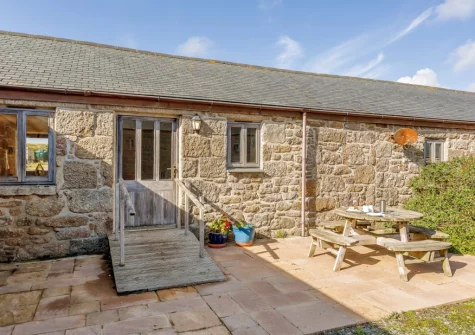 The patio & alfresco dining area at Knights Cottage, Lamorna