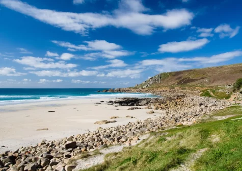 Enjoy the open coastline and wide sandy beach of Sennen Cove, a welcoming seaside spot just along the coast from Land's End.