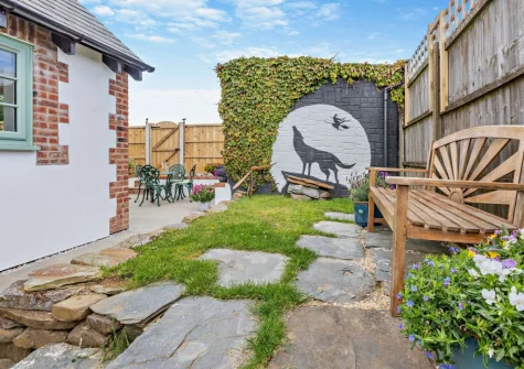 The garden & outdoor sitting area at Kosi Kot, South Molton