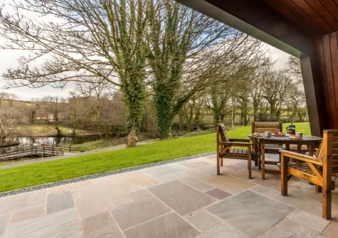 The patio & alfresco dining area at Lakeside Haven, Kilkhampton