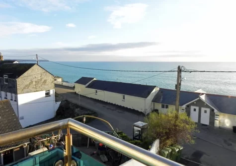 The sea view from the balcony & outdoor sitting area at Lamorna, Porthleven