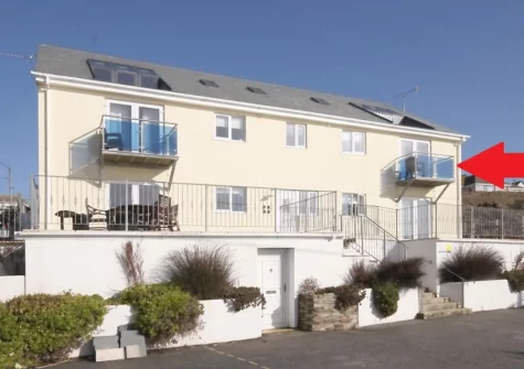 Lamorna is a first floor apartment mere metres from the beach in the charming Cornish fishing port town of Porthleven