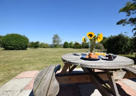 The patio & alfresco dining area at Lantern Cross Cottage, Beaford