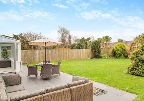 The patio, alfresco dining area & garden at Lanveans, Bude