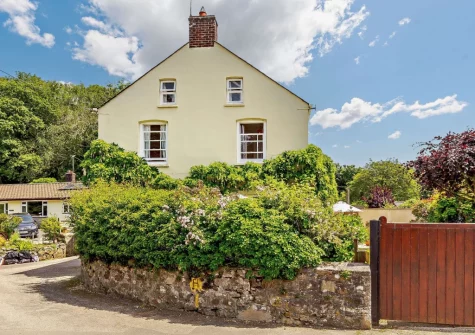 Lanyons Cottage is a spacious & attractive cottage in the wing of large house overlooking the village playing field with tennis court