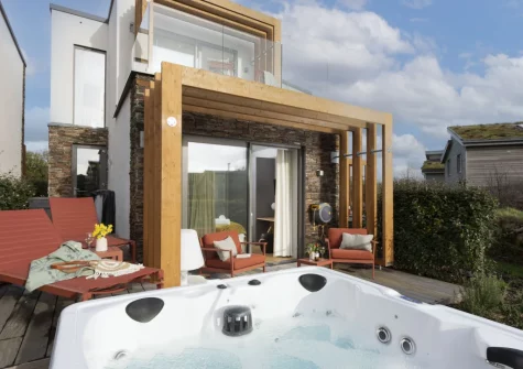 The patio, outdoor sitting area & hot tub at Lefransa at Una, St Ives