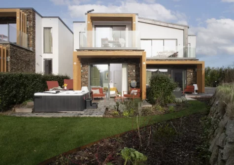 The patio, outdoor sitting area & hot tub at Lefransa at Una, St Ives