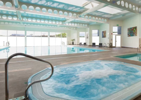 The indoor swimming pool & jacuzzi is one of several spa facilities you can enjoy