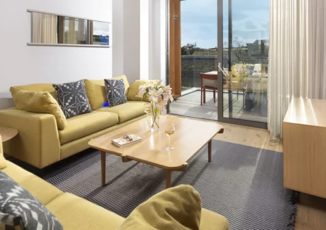 Lefransa, Carbis Bay is a sleek two-bedroom eco-retreat at Una St Ives Resort, boasting a private hot tub, sun-drenched balcony, complimentary spa access and golden sands just a short stroll away; it's ideal for families and couples alike.
