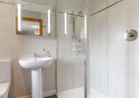 The shower room at Legacy Cottage, Bokiddick