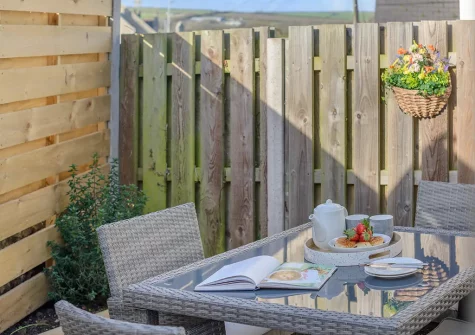 The courtyard & alfresco dining area at Leven Lodge, Porthleven