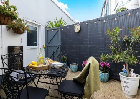 The enclosed courtyard garden & alfresco dining area at Lilly's Cottage, Dawlish